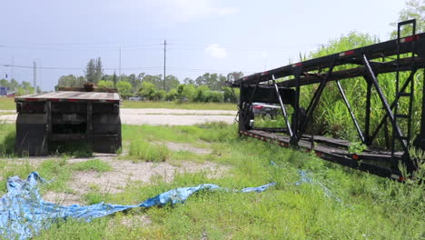 lonely trailer and flat bed on the edge of the town