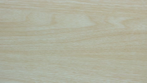 stop motion - top view of empty ceramic dip sauce bowl isolated on wood table background