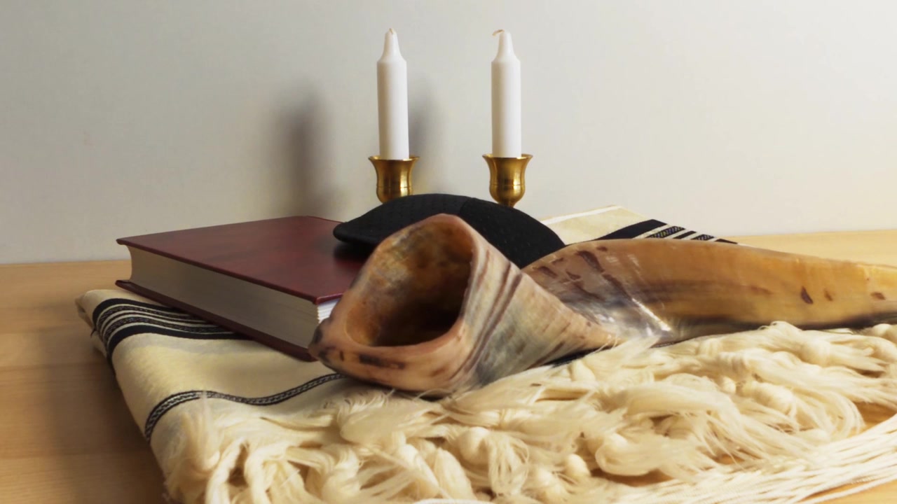 Traditional Jewish Religious Items Including Shofar and Tallit