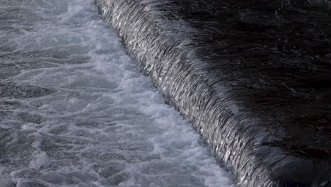 water cascading over a man-made structure