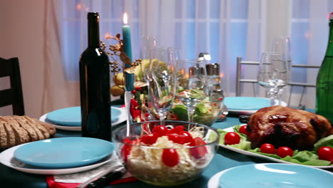 bottle of champagne on the table with traditional food