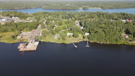 Aerial-pullback-shot-of-the-shores-at-Woolwich-Maine,-ME