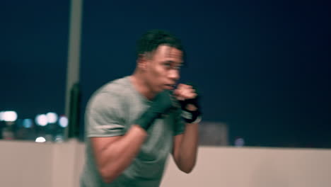 black man, boxing and fitness on rooftop at night