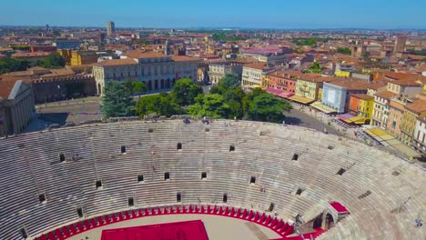 aerial view of arena di verona, italy. the video was filmed above the arena and the houses of verona are visible in the distance.