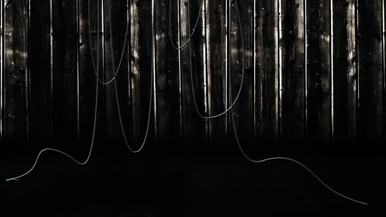 Animation of hanging cables and wooden boards on dark background