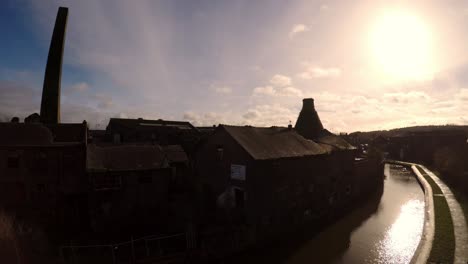 Aerial-footage-of-an-old-abandoned,-derelict-pottery-factory-and-bottle-kiln-located-in-Longport,-Stoke-on-Trent,-Staffordshire