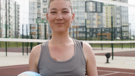 close-up view of brunette volleyball player outdoors