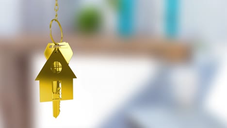 Animation-of-gold-house-key-fob-and-key-dangling-over-out-of-focus-interiors-with-copy-space