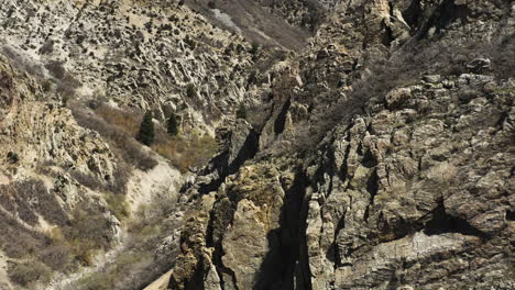 rugged cliffs by hiking trails in rock canyon, utah - aerial