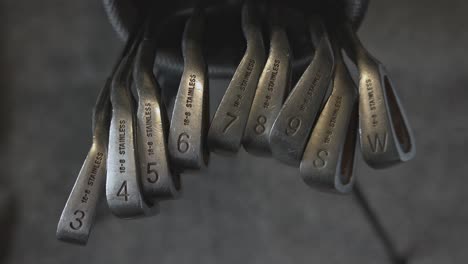 top-down shot of a full set of golf clubs within a golfers bag