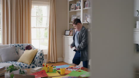 funny-teenage-boy-with-down-syndrome-dancing-in-living-room-having-fun-celebrating-with-silly-dance-moves-happy-kid-enjoying-weekend-at-home-4k