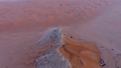 4k drone footage, aerial view of fossil rocks plateau in mleiha desert with sand ripples, geological landscape of the sphinx in sand dunes desert in the united arab emirates, drone videos