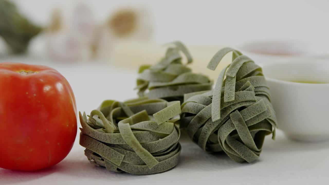 Panels appearing, drifting left over tomatoes, pasta; camera panning right, forming UI tiles