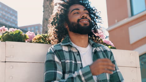 young man relaxing in the city