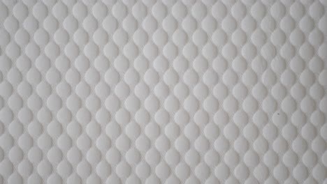 white quilted fabric texture