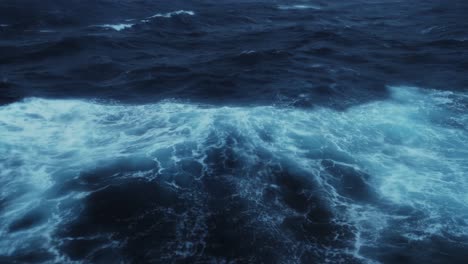 turbulent dark blue ocean waves