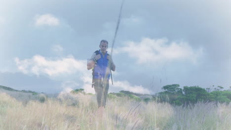 middle-aged hiker adjusting backpack in field, viewing floating heart rate graph tracking health