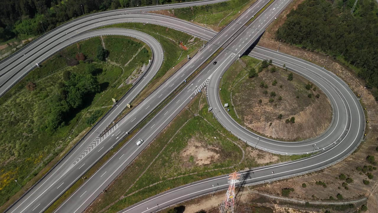 Highway Interchange Aerial Shot During Sunset with Traffic
