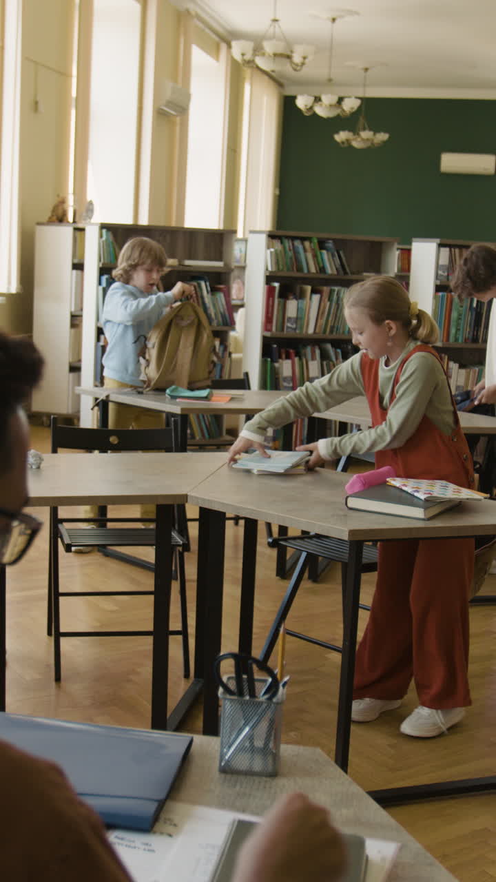 Children and students preparing in a classroom or library