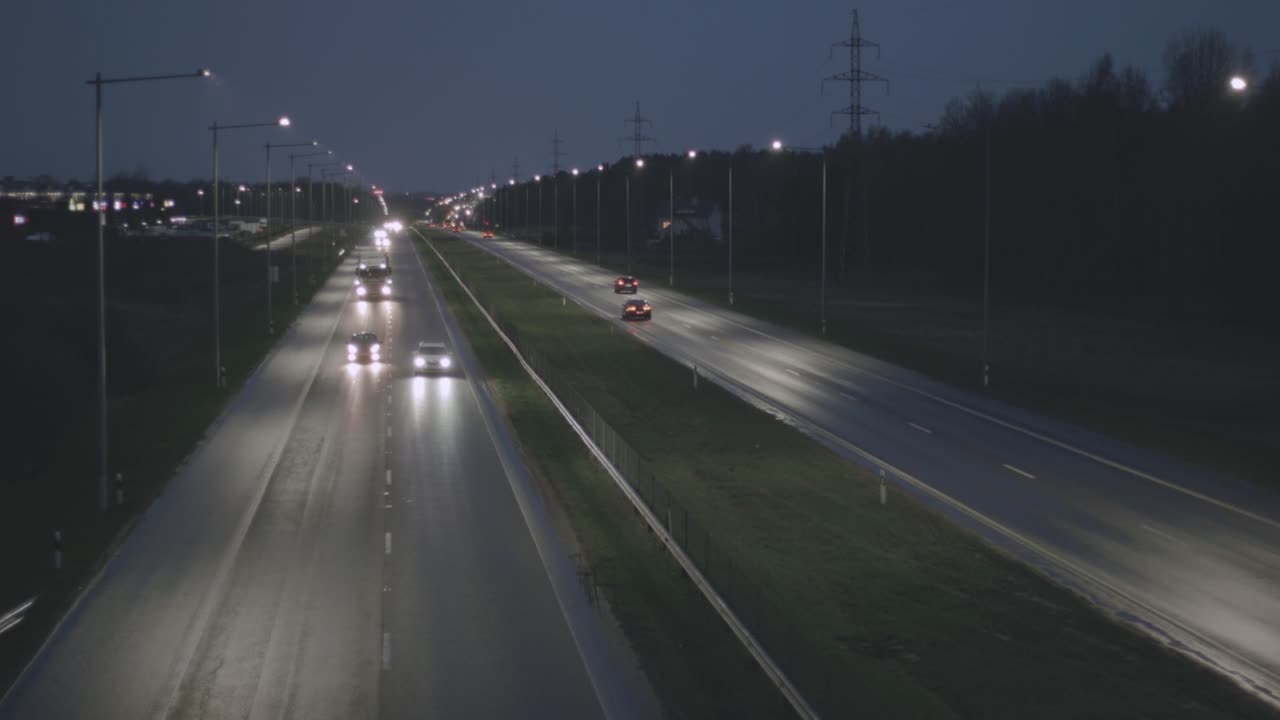 Cars at city bypass at night
