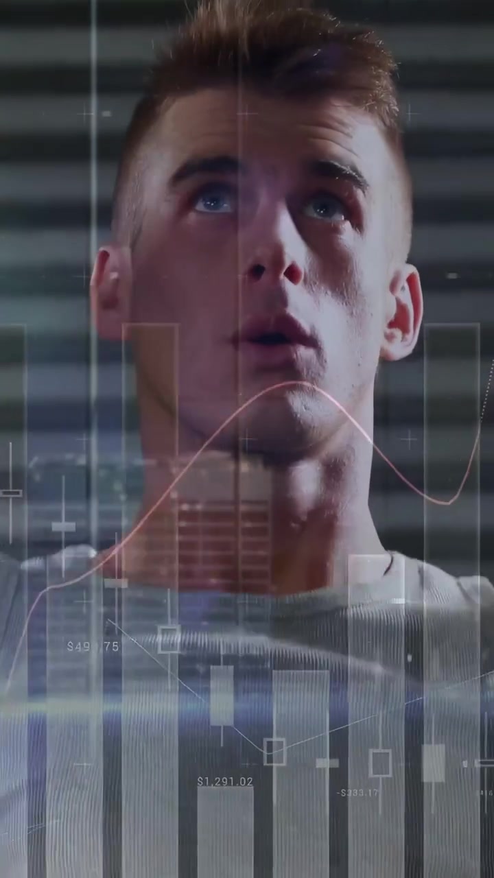 Vertical video: Camera zooming out, trainee raising arms overhead while charts showing progress