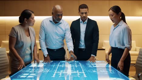 a diverse team collaborates over advanced technology display in modern conference room, analyzing digital blueprint and strategic plans for future projects