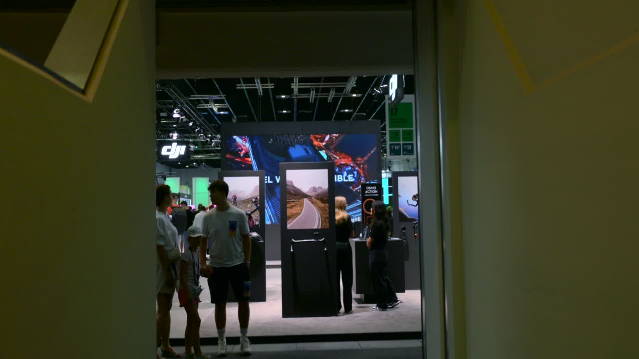 interactive exhibit at the IFA Berlin trade show, showcasing innovative technology displays through a modern architectural frame