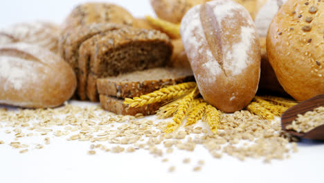 various bread loaves with wheat grains