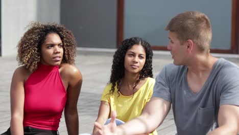 multiracial friends talking outdoor