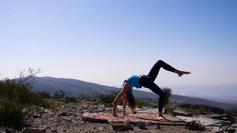 western traveler girl practicing outdoor yoga in oman, different poses in other clips available