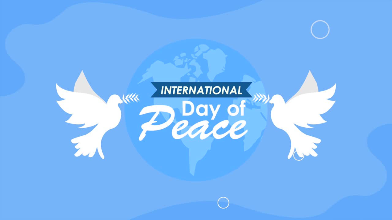 international day of peace lettering with doves