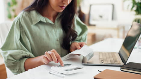 woman checking receipts and bills