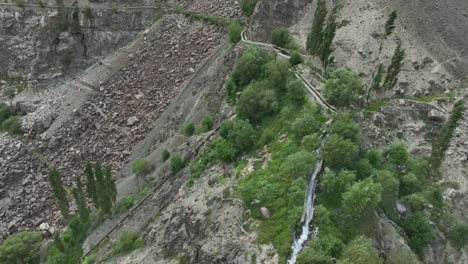 skardu's mantoka waterfall in rugged terrain, pakistan