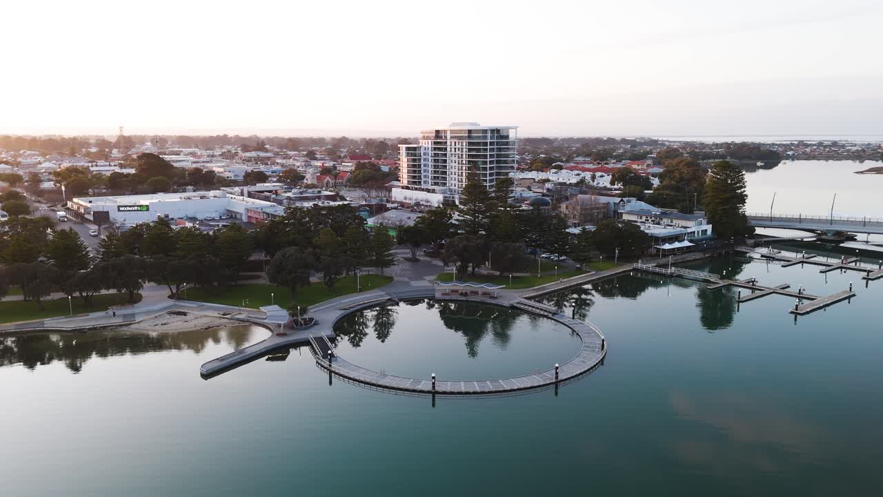 Mandurah foreshore at sunrise, orbiting drone shot