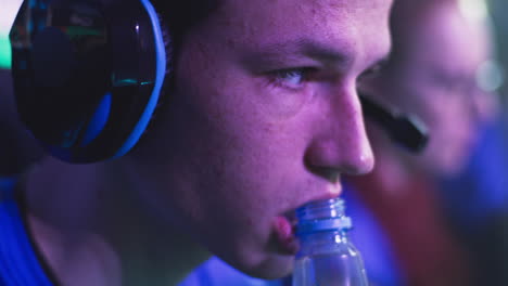gamer drinking water from bottle
