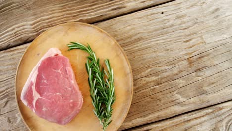 steak and rosemary in plate