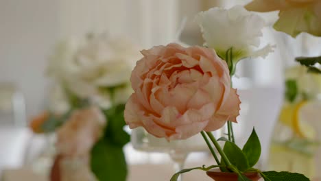 close-up of flowers on a wedding table. pink and white roses