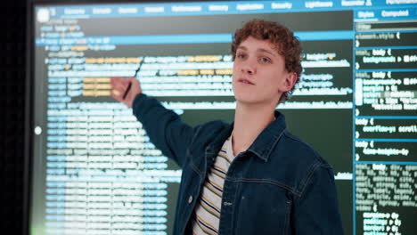 man presenting computer code