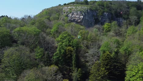 Great-Orme-colourful-suspended-cable-car-journey-along-scenic-Llandudno-mountain-aerial-view