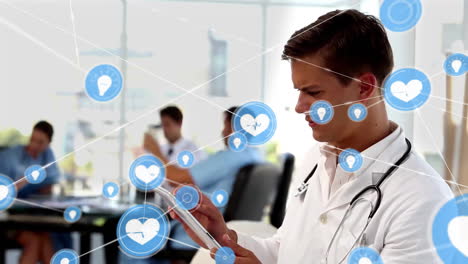 animation of healthcare communication network over happy caucasian male doctor using tablet