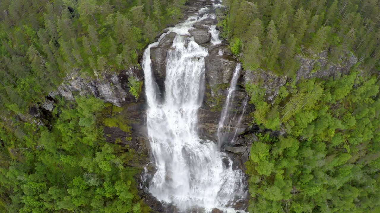 Aerial footage from Tvindefossen waterfall from the bird's-eye view, Norway