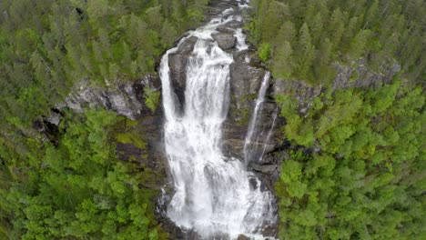 aerial footage from tvindefossen waterfall from the bird's-eye view, norway