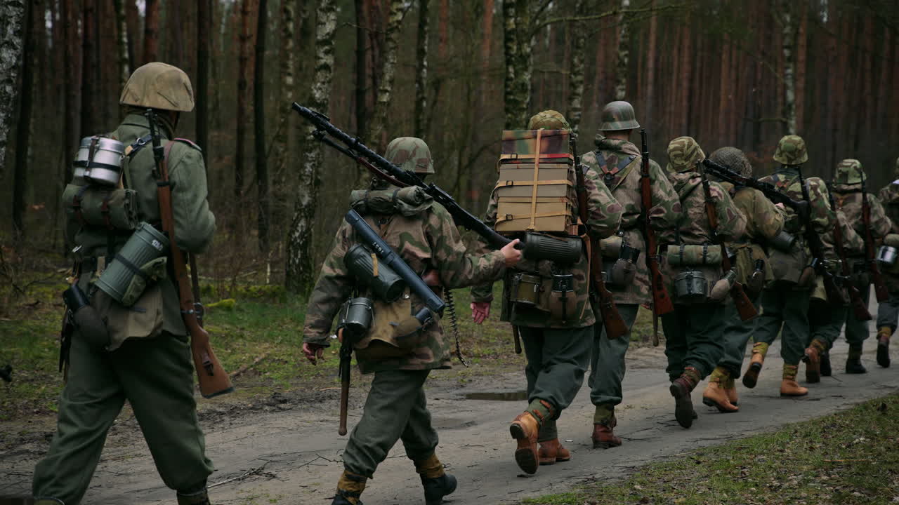 German Soldiers Marching in WWII Reenactment
