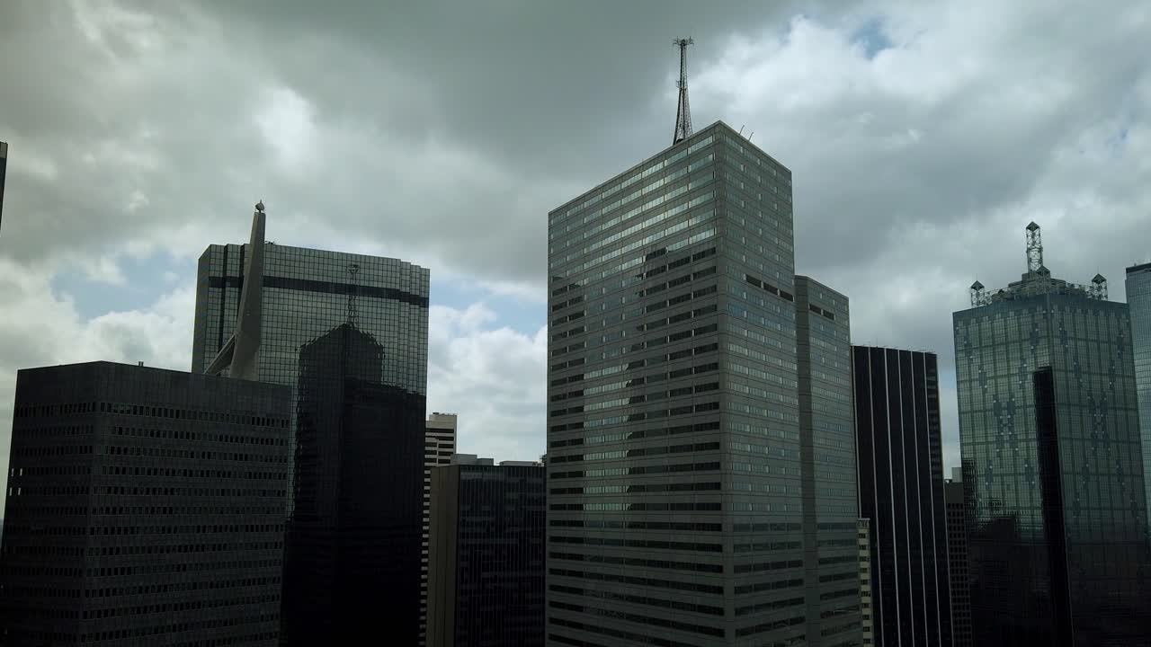 Time Lapse of Clouds Passing By Quickly over Downtown Dallas, Texas with Camera Zoom Out