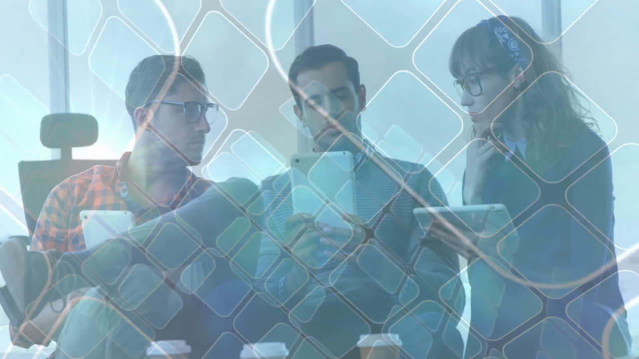 Tech colleagues collaborating on tablets in office lounge, featuring floating geometric data charts