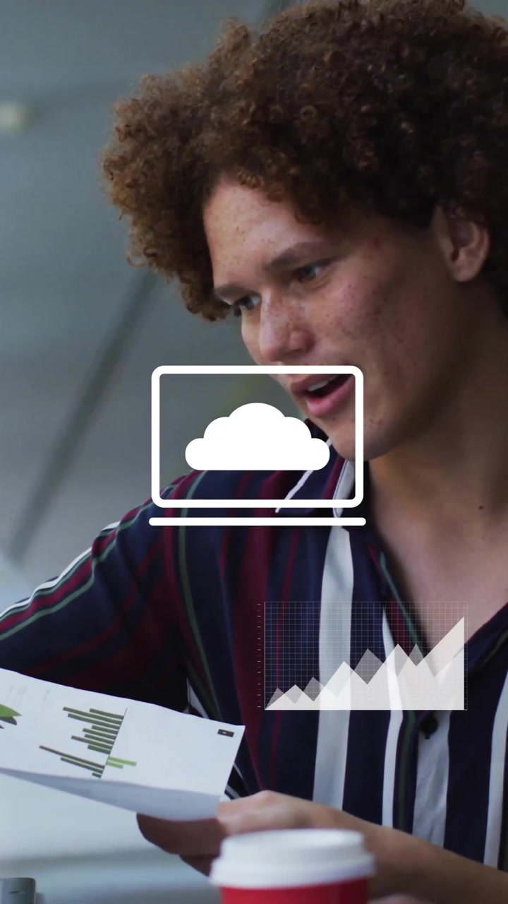 Animation of media icons processing over diverse male colleagues talking at casual office
