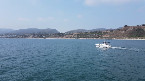 Boat-Traveling-Through-Water-Aerial