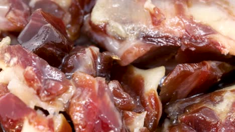 Macro-shot-of-small-serrano-ham-slices-rotating