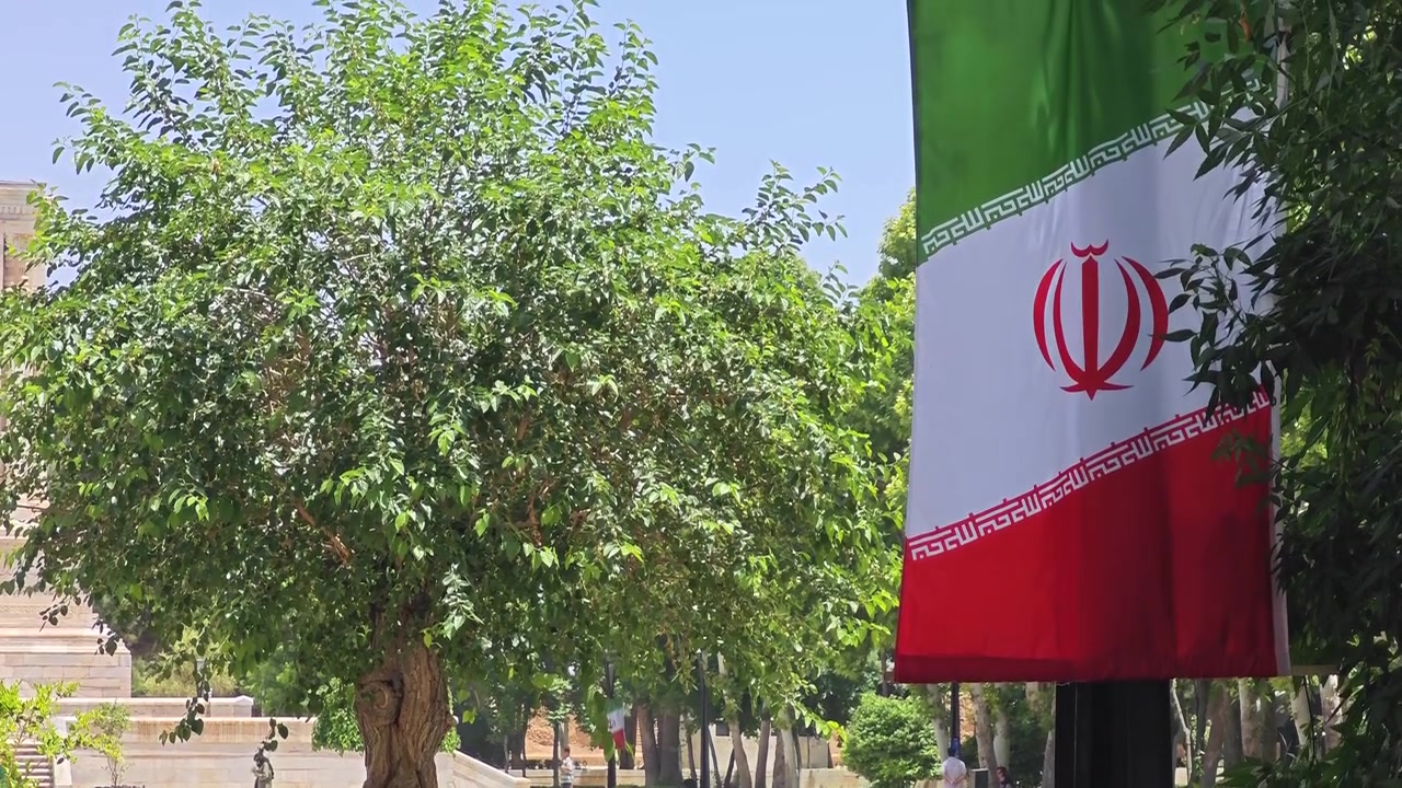 Flag of Iran Hanging in a Public Park