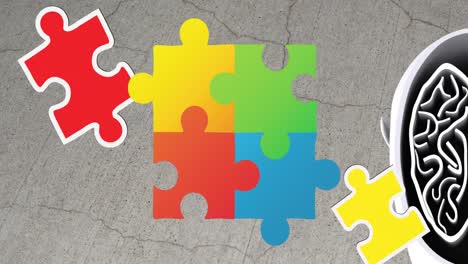 Animation-of-colourful-puzzle-pieces,-autism-awareness-month-text